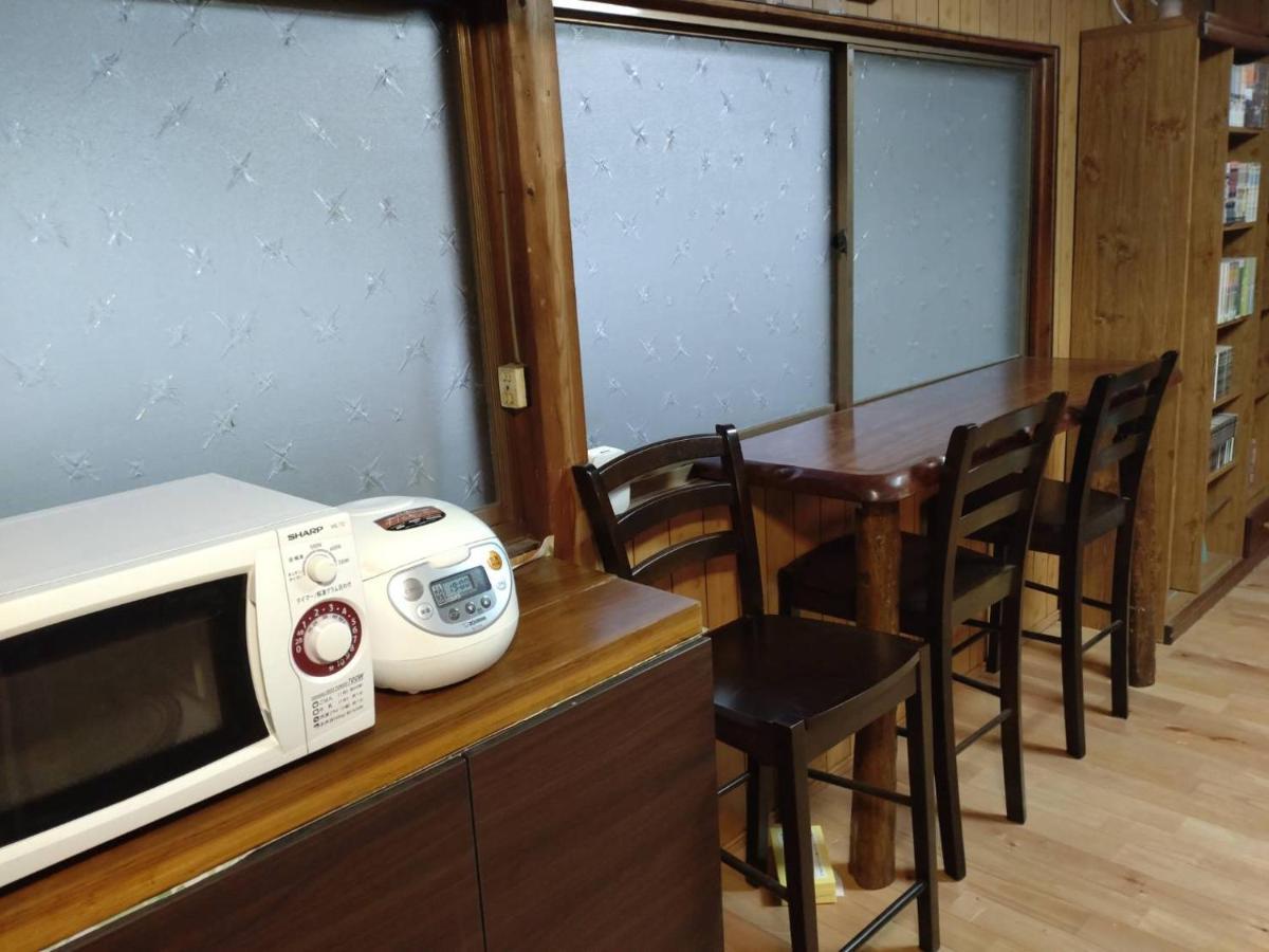 Momiji Hostel Minamiaso Bagian luar foto